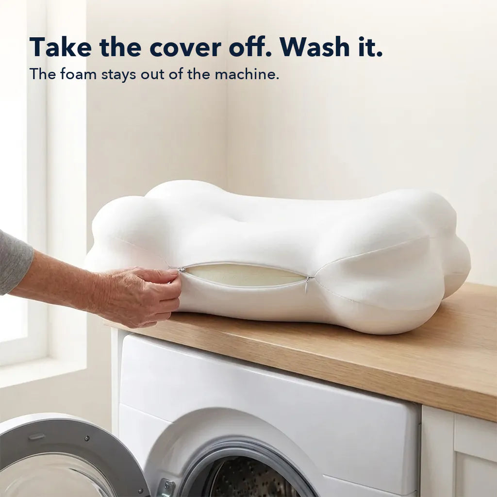 Take the cover off. Wash it. The foam stays out of the machine.