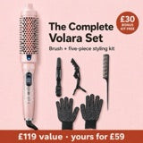 The complete Volara set with the pink brush, two sectioning clips, a tail comb and two styling gloves